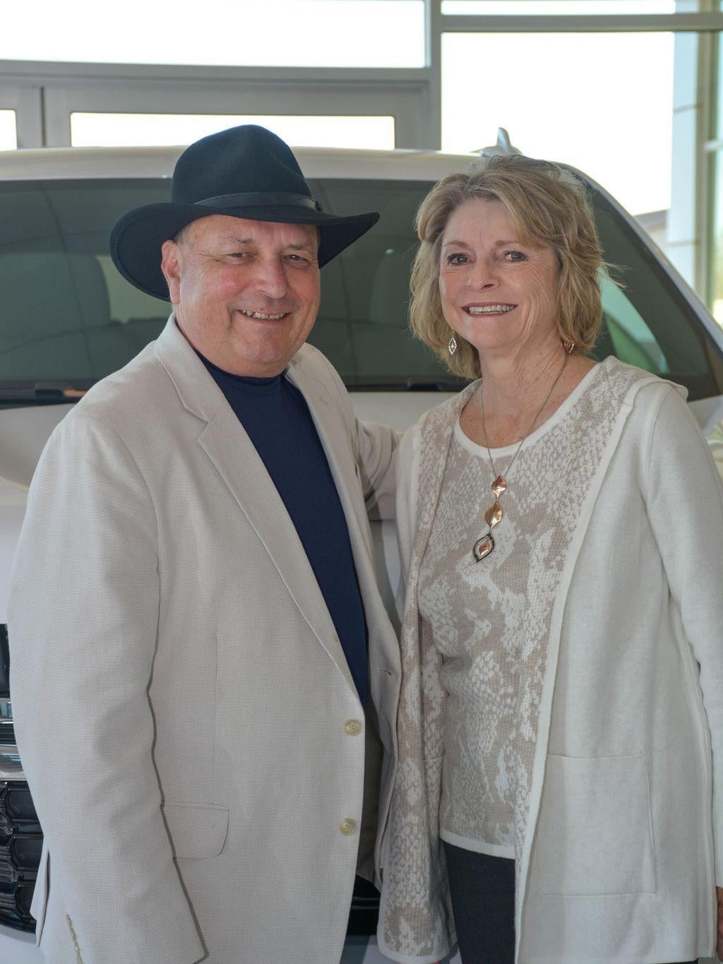 Portrait of Vince and Jana, owners of the dealership since 1983