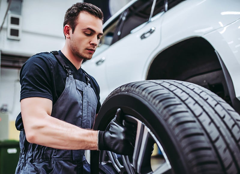 Mechanic working on car